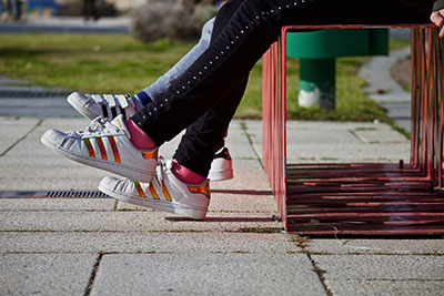 image of teenagers on a bench