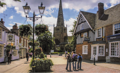 Three people walking through Solihull