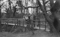 black and white photo of people on a bridge at Ravenshaw