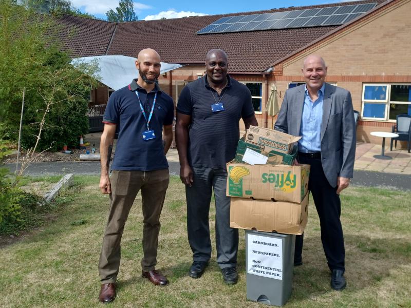 Staff and Councillor outside Park View building with recycling