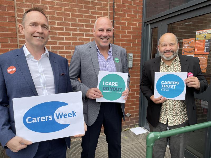 Cllr Michael Gough, Cllr Tony Dicicco, and Brandon Scott-Omenka celebrate the start of Carers Week in Solihull