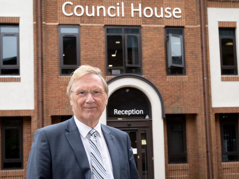 Councillor Courts stands outside the council house