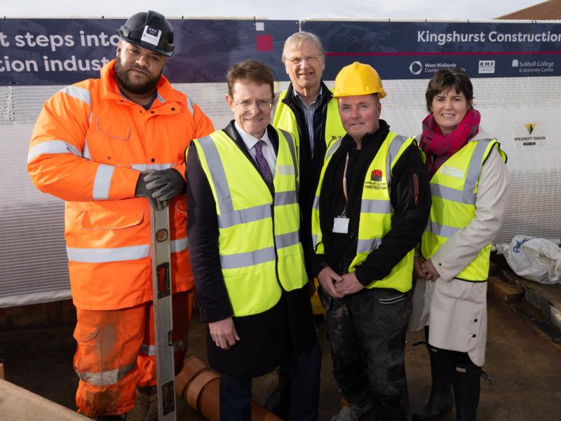 Mayor Andy Street, Cllr Ian Courts and Cllr Karen Grinsell with a learner, Nathan, and a tutor at Kingshurst Construction Training Hub.