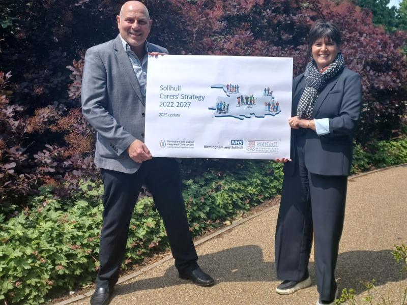 Cllr Dicicco and Cllr Grinsell with the updated Carers Strategy and action plan.