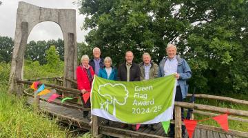 Cllr Courts and Cllr Hawkins with Friends of Hope Coppice as they celebrate the new Green Flag award
