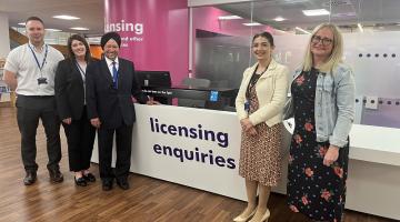 Cllr Marwa and Cllr Qais join officers from SMBC in the new licensing reception area