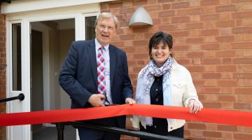 Councillor Courts and Councillor Grinsell cut the ribbon on the first new childrens home