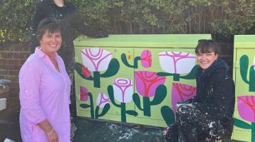 Pickle Illustration and Cllr Grinsell with one of the newly painted utility boxes
