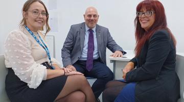 Cllr Tony Dicicco talks with Solihull Healthcare Partnership carer champions, Lee Anne and Jennie.