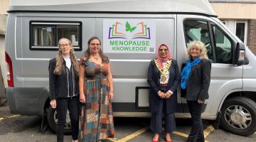 The Mayor of Solihull stood in front of the Menopause knowledge bus