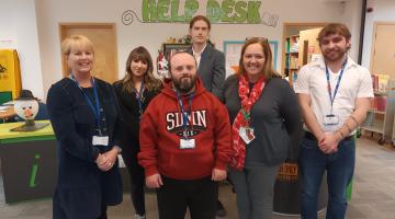 Corey and his mom Tracey with his team at Chelmsley Wood Library