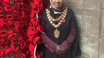 The Mayor of Solihull pictured next to the St Alphege knitted poppies installation