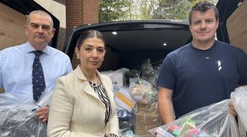 Cllr Wazma Qais, centre, with Richard Staveley from Solihull Council’s regulatory services team (left) and Josh Jensen from Lighthouse Security (right)