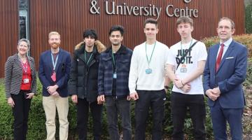 Four students, lecturer and vice principal from Solihull College & University Centre standing outside the College with Councillor Gough