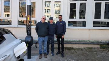 Cllr Andy Mackiewicz with Martin Hale, Managing Director at Qwello (UK) Ltd and Druvesh Desai, Project Manager at Qwello (UK).