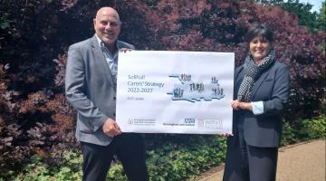 Cllr Dicicco and Cllr Grinsell with the updated Carers Strategy and action plan.