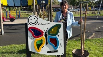 Cllr Karen Grinsell at the newly-installed sensory board at Jacey Park