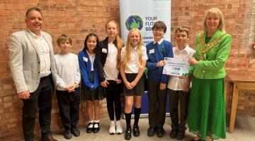 Pupils from Bishop Wilson Primary School receiving their certificate from The Mayor of Solihull and award sponsor, Flannery Plant Hire  