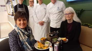Cllr Grinsell and Cllr Delaney enjoying lunch cooked and served by Chelmsley Starters students (left to right) Luca, Evie and Nathan at the Bluebell Wood eatery, run by Adam Pickett.