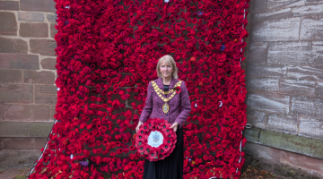 Mayor of Solihull - outside the knitted Poppy wall at St Alphege Church