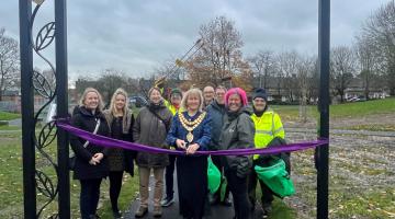 The Mayor of Solihull cuts a ribbon to mark the completion of the Kingshurst Park enhancement project