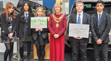 The Mayor of Solihull joined by students at WMG Academy for Young Engineers Solihull displaying some of their artwork