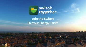 A landscape image of houses in the distance as the sun is setting with the switch together logo at the top centre, and writing below reading 'Join the switch. Fix your energy tariff.'