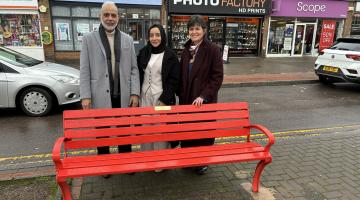 Thanieth Khan, her father and Cllr Karen Grinsell standing at Thanieth's bench in Shirley