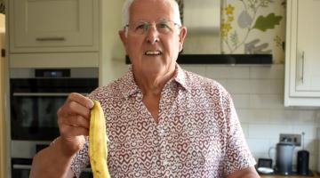 Cllr Ken Hawkins with the new food kitchen caddy
