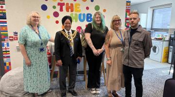 Names of people in photo (left to right): Yvonne Obaidy (Operations Manager, Children’s Improvement and Standards), the Mayor of Solihull, Councillor Sardul Singh Marwa MBE JP, Eve Carter (care-experienced young person), Selina Rawicz (Head of Service, Corporate Parenting), Jamie Owen (Operations Manager, Corporate Parenting)