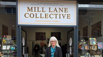 Councillor Delaney stood outside the Mill Lane Collective
