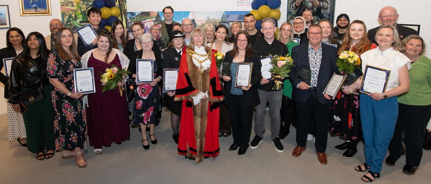 Civic honours award winners with their certificates and the Mayor of Solihull