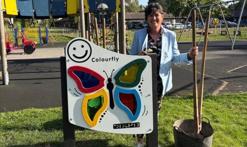 Cllr Karen Grinsell next to the play equipment at Jacey Park