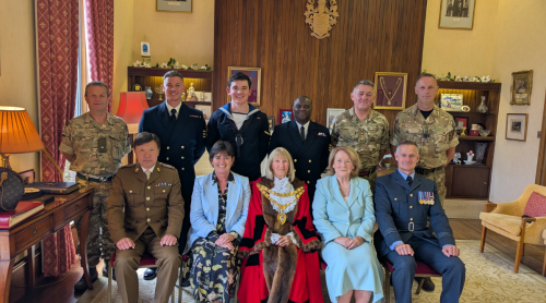 The Mayor of Solihull, Leader of the Council and County President of Warwickshire and Birmingham RBL, alongside military personnel.