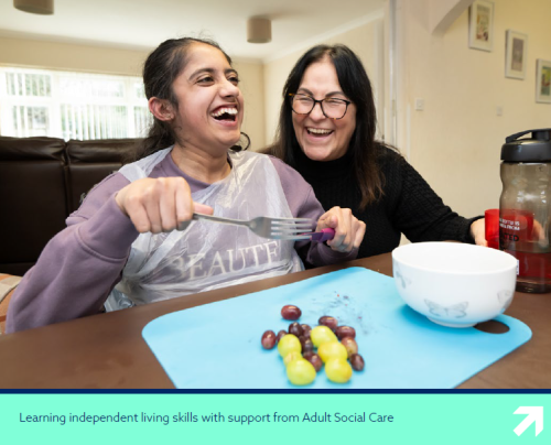 photo of woman learning independent living skills with support from Adult Social Care