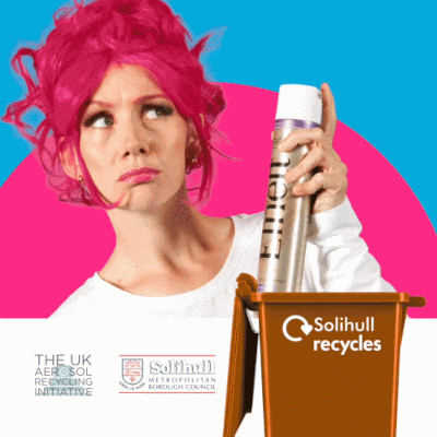 Image of a woman holding a can of hairspray