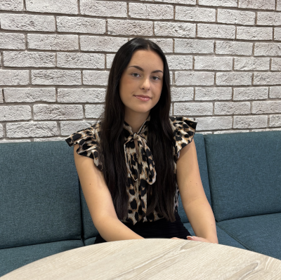 Apprentice sitting at a desk
