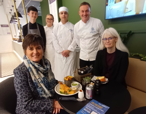 Cllr Grinsell and Cllr Delaney enjoying lunch cooked and served by Chelmsley Starters students (left to right) Luca, Evie and Nathan at the Bluebell Wood eatery, run by Adam Pickett.