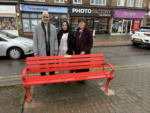 Thanieth Khan, her father and Cllr Karen Grinsell standing at Thanieth's bench in Shirley