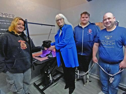 Jessie, Rufus, Cllr Delaney, Harry and Matt from Snooty Pooch CIC at a dog grooming taster session with the Youth Trailblazer programme