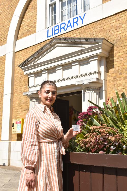 Cllr Wazma Qais outside Dickens Heath Library